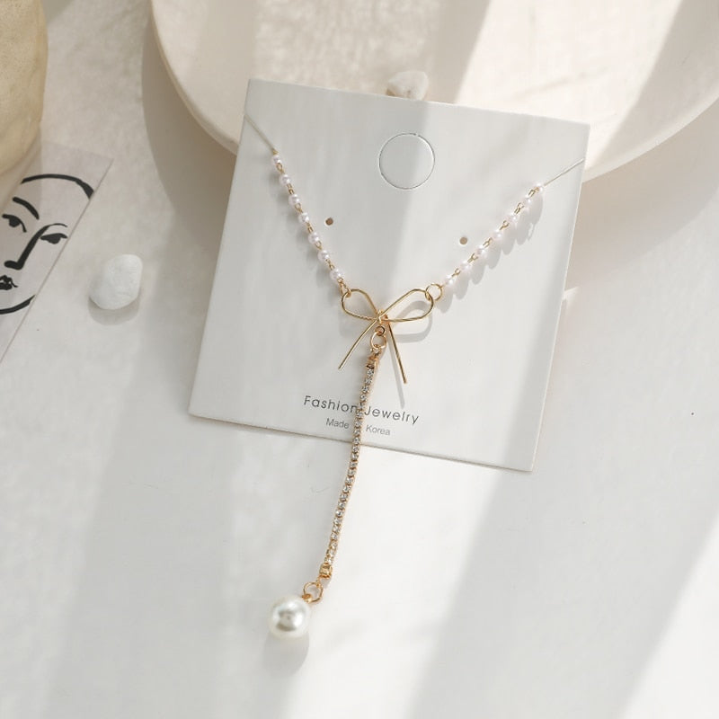 2020 women geometry necklace, pearl asymmetry of fashionable, metal, aureate bowknot, collarbone chain necklace fashion